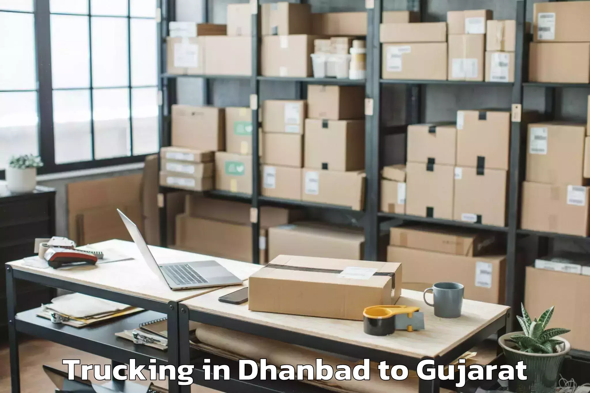 Reliable Dhanbad to Visavadar Trucking